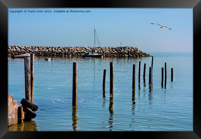 The quiet harbour of Rhos-on-Sea. Framed Print by Frank Irwin