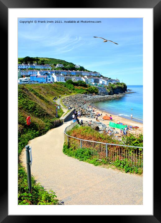 Enjoying time in the sunshine on New Quay beach Framed Mounted Print by Frank Irwin
