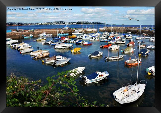 Small boats lie at anchor in Paignton Harbour Framed Print by Frank Irwin