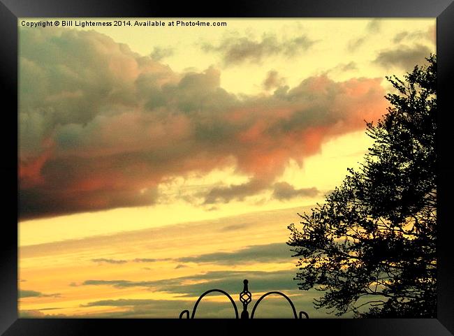 Clouds and a Tree ! Framed Print by Bill Lighterness
