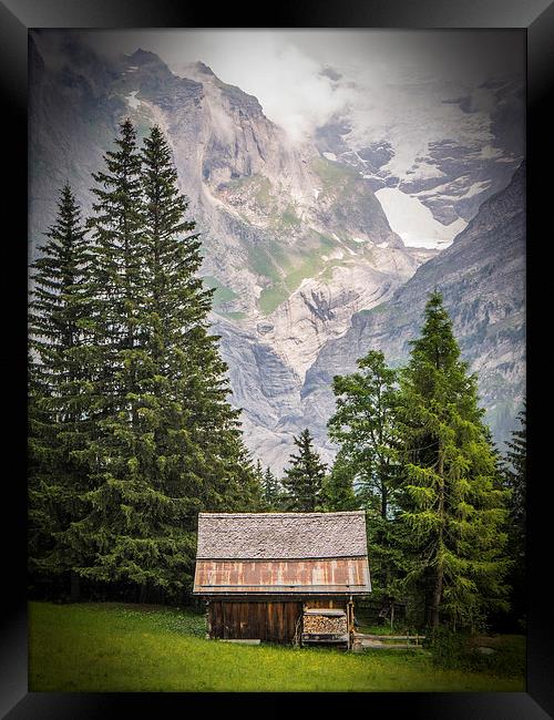 Mountain Hut Framed Print by Laura Kenny