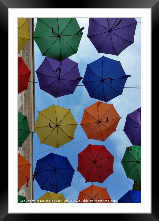 Colorful umbrellas Framed Mounted Print by Marinela Feier