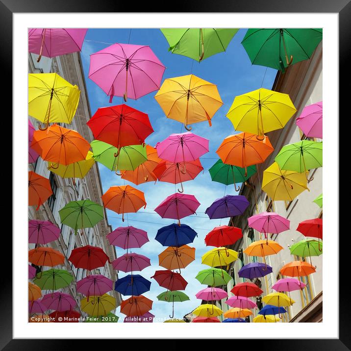 Roof of umbrellas Framed Mounted Print by Marinela Feier
