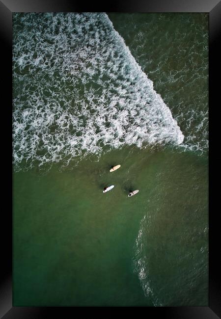 Three go Surfing Framed Print by Dan Ward