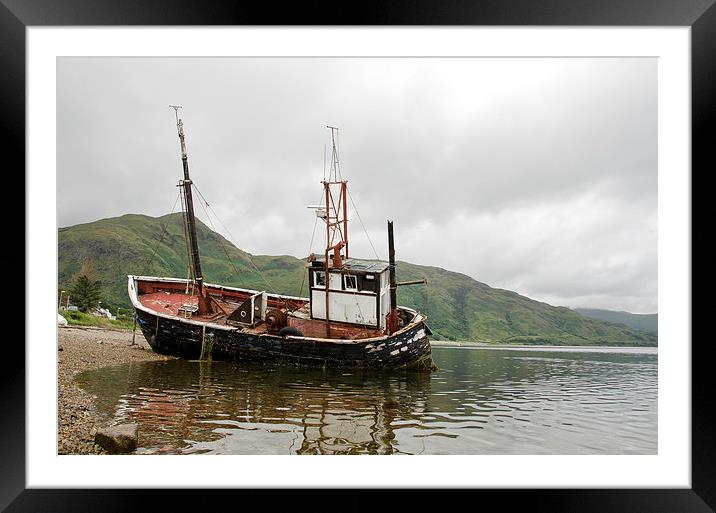 Abandoned fishing boat Framed Mounted Print by Dan Ward