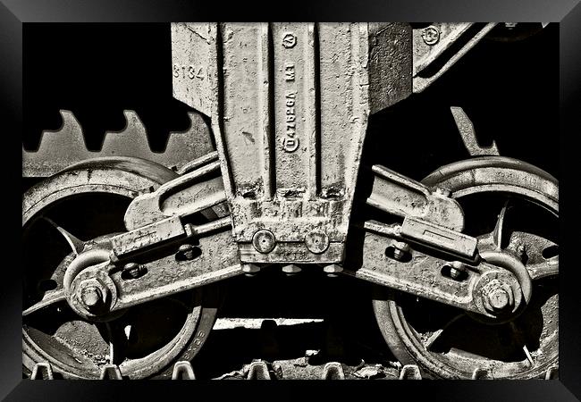  Tank Wheels Framed Print by Tom and Dawn Gari