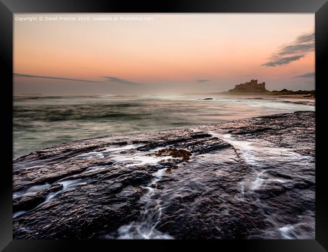 Bamburgh Castle, view from Harkness Rocks Framed Print by David Preston
