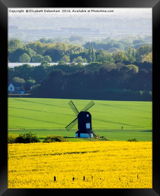 Windmill in a field of Yellow Oilseed Rape Framed Print by Elizabeth Debenham