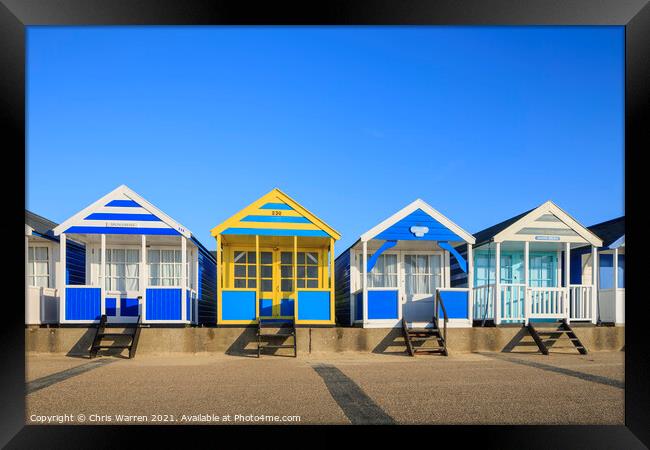 Colourful beach huts at Southwold Suffolk England  Framed Print by Chris Warren