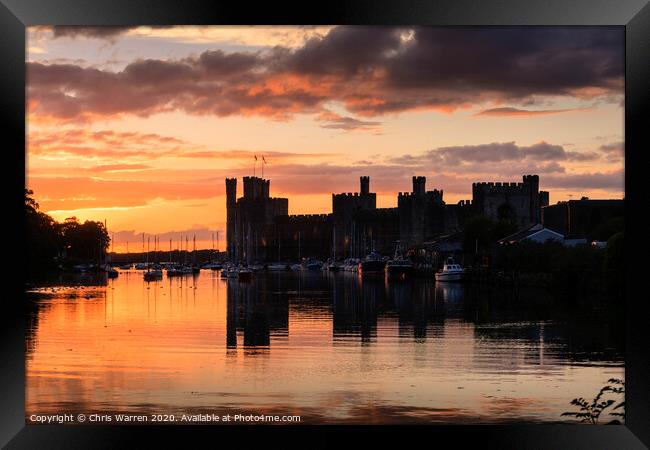 Caernarfon Castle at Sunset Framed Print by Chris Warren