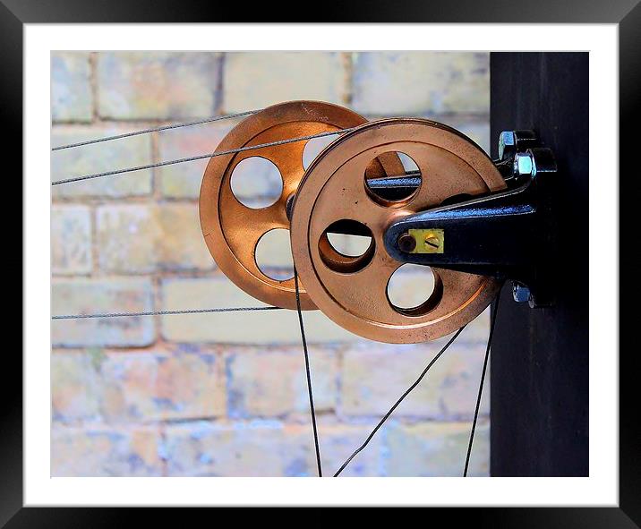 Pulleys in the tool room Framed Mounted Print by Robert Cane