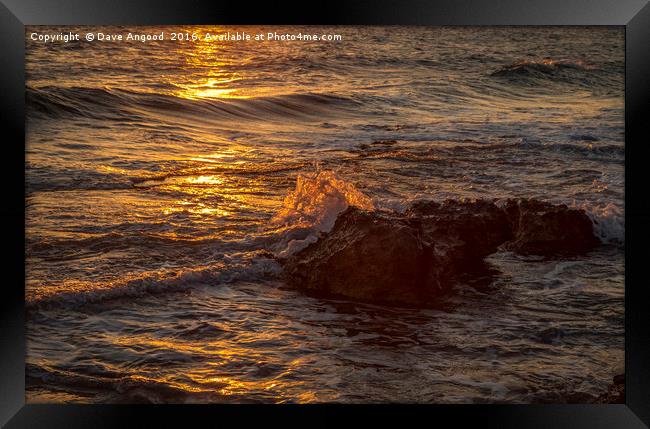 Sunlight on waves Framed Print by Dave Angood