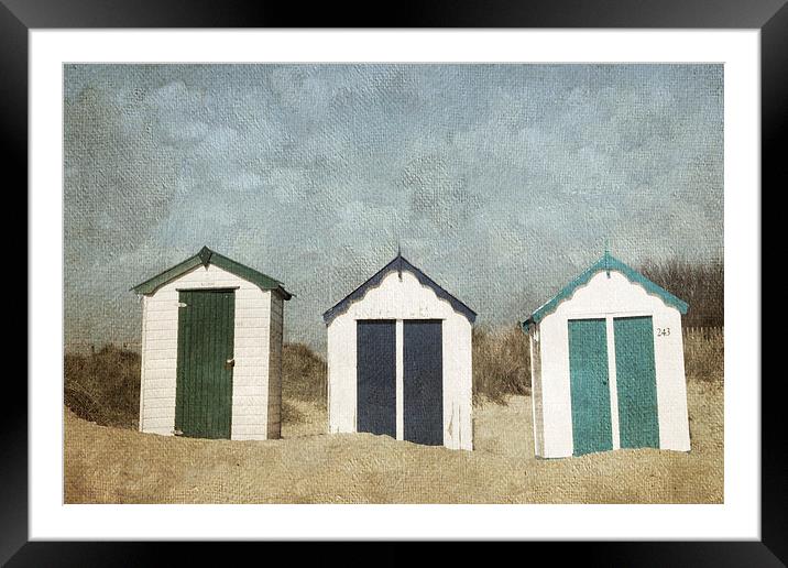 Three Little Beach Huts Sitting on a Beach Framed Mounted Print by Lesley Mohamad