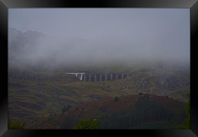 Fog Over The Stwlan Dam Framed Print by rawshutterbug 