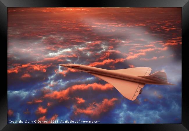 Concorde flying in a sunrise clouds Framed Print by Jim O'Donnell