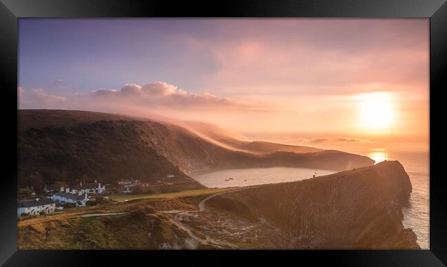 Misty Lulworth Cove sunrise from Stair Hole Framed Print by Kevin Browne