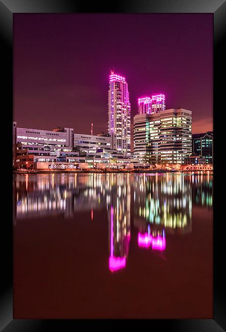 Pink lights at Canary Wharf Framed Print by John Ly