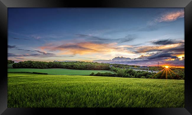  Sunset on Wheatfields in Kent Framed Print by John Ly