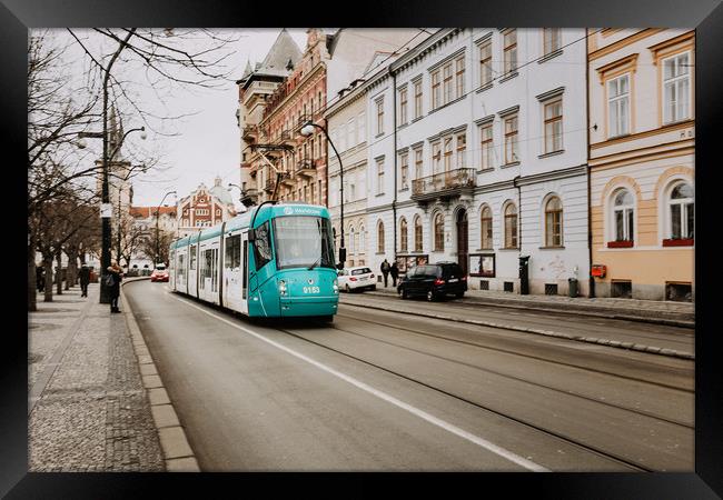 Prague Street with tram Framed Print by John Ly