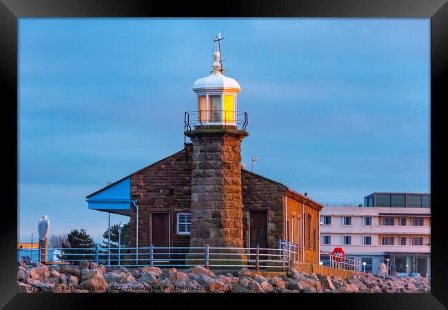 Lighthouse on the Stone Jetty Framed Print by Keith Douglas