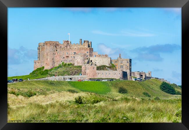Bamburgh Castle from the South East Framed Print by Keith Douglas