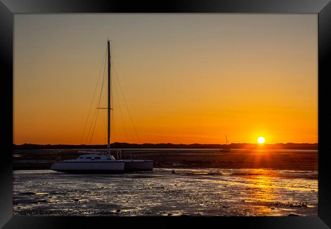 Boats moored at Ravenglass at Sunset Framed Print by Keith Douglas