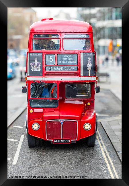 Red Bus to Trafalgar Square Framed Print by Keith Douglas