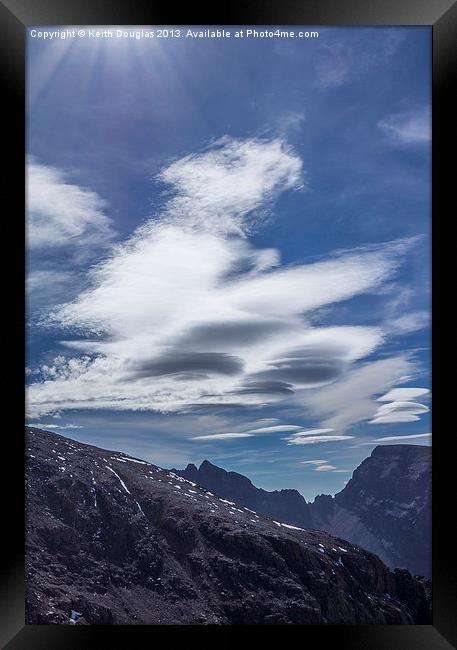 Lenticular clouds and sunrays Framed Print by Keith Douglas