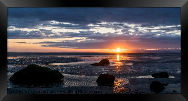 Sunset on the shore Framed Print by Keith Douglas