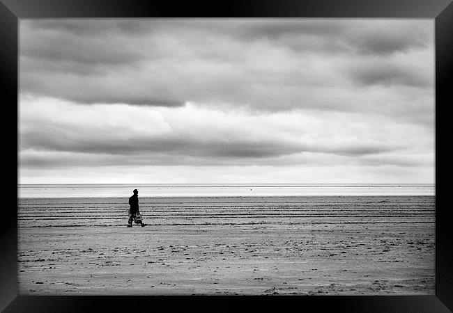 Beach walker Framed Print by Paul Walker