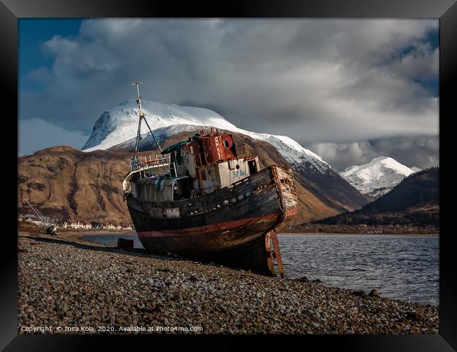 Wreckage in the shadows of Ben Nevis's snow-capped Framed Print by Inca Kala