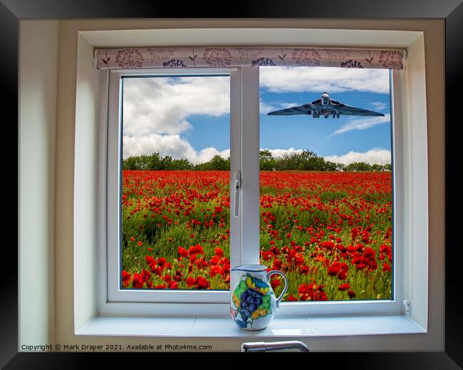 Through my kitchen window, a Vulcan over a poppy field. Framed Print by Mark Draper