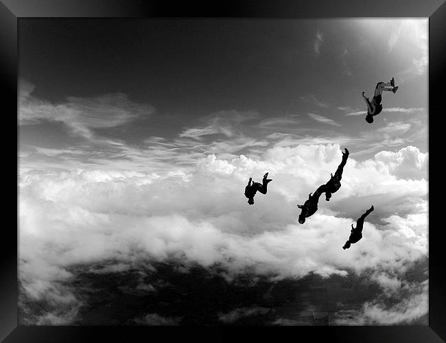 skydive in the clouds Framed Print by Ewan Cowie