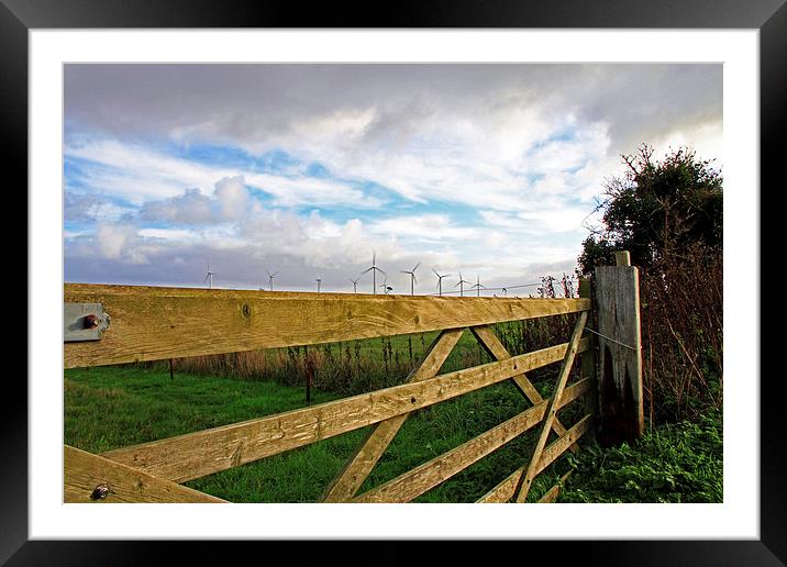 Somerton Church Gate Looking at Windturbines Framed Mounted Print by James Taylor