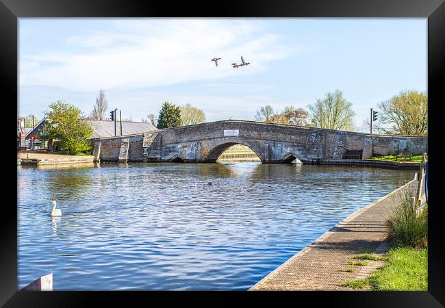 Potter Heigham Bridge with flying ducks Framed Print by James Taylor