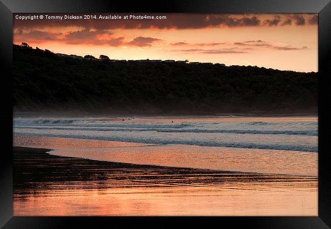 Riding the Waves at Cayton Bay Framed Print by Tommy Dickson