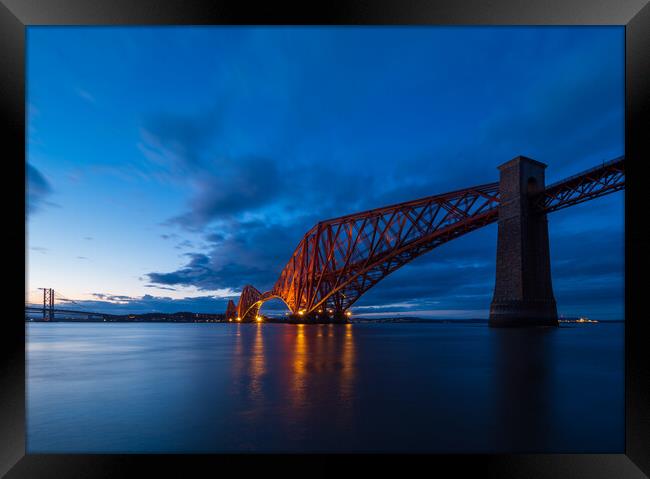 Forth Bridge at dusk. Framed Print by Tommy Dickson