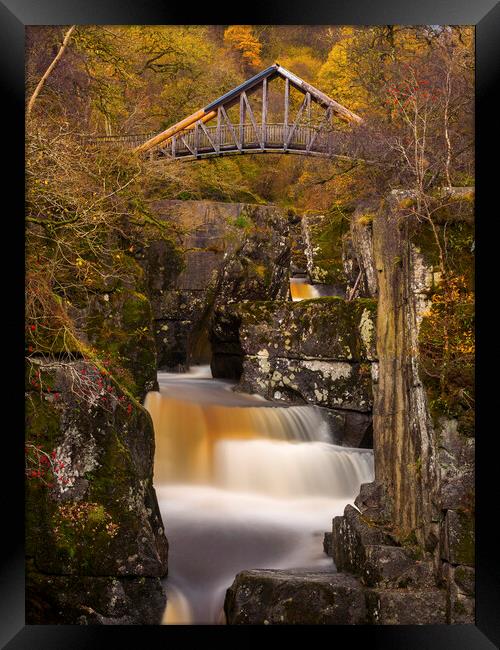 Bracklinn Falls and footbridge. Framed Print by Tommy Dickson