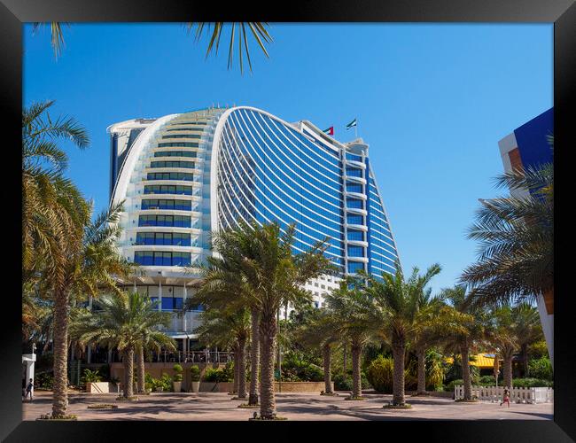 Jumeirah Beach Hotel, Dubai. Framed Print by Tommy Dickson