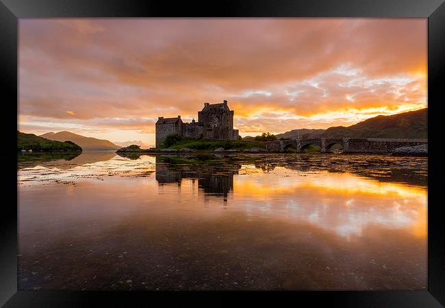  Eilean Donan Castle, Scotland at sunset Framed Print by Daugirdas Racys