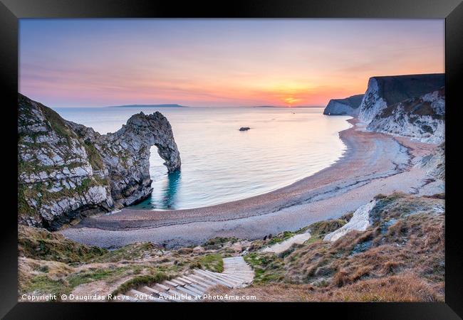 Durdle Door Sunset Framed Print by Daugirdas Racys