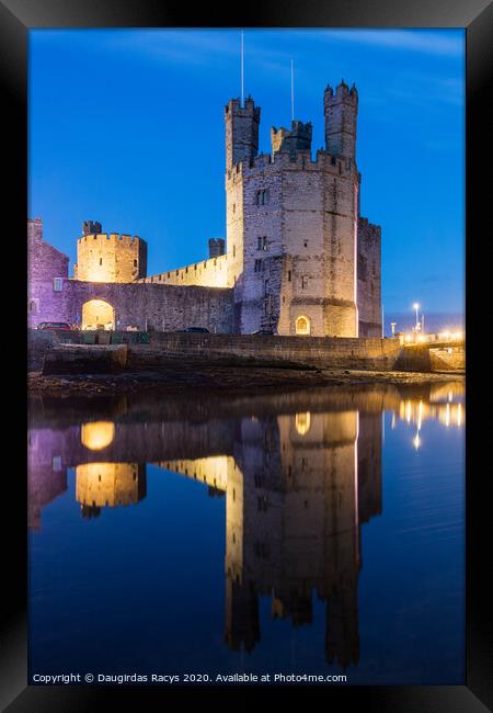 Caernarfon Castle at dusk Framed Print by Daugirdas Racys