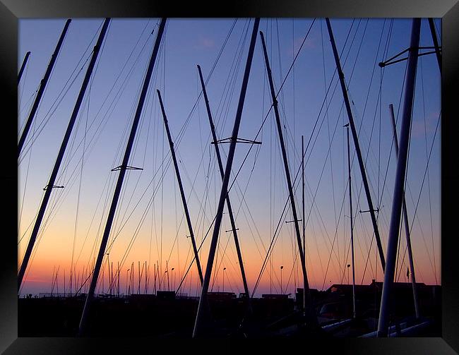 Masts at sunset Framed Print by John B Walker LRPS
