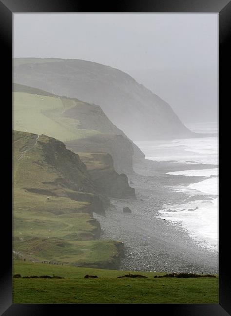 Misty Rugged North Devon Coast Framed Print by Mike Gorton