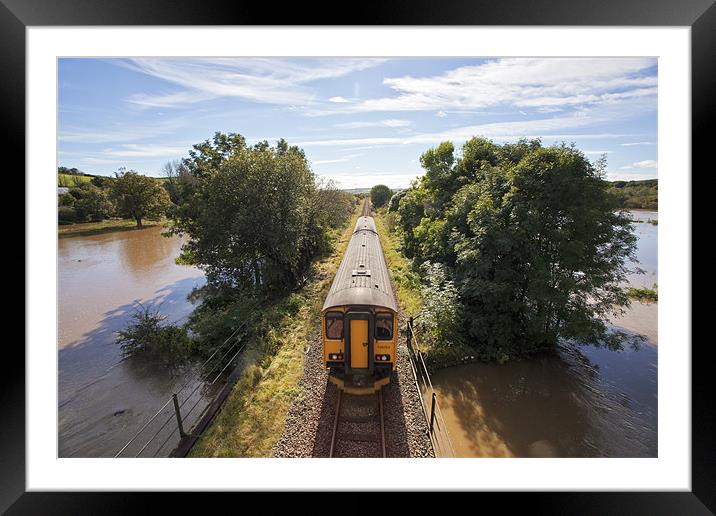 Train Journey Through Flooded Land Framed Mounted Print by Mike Gorton