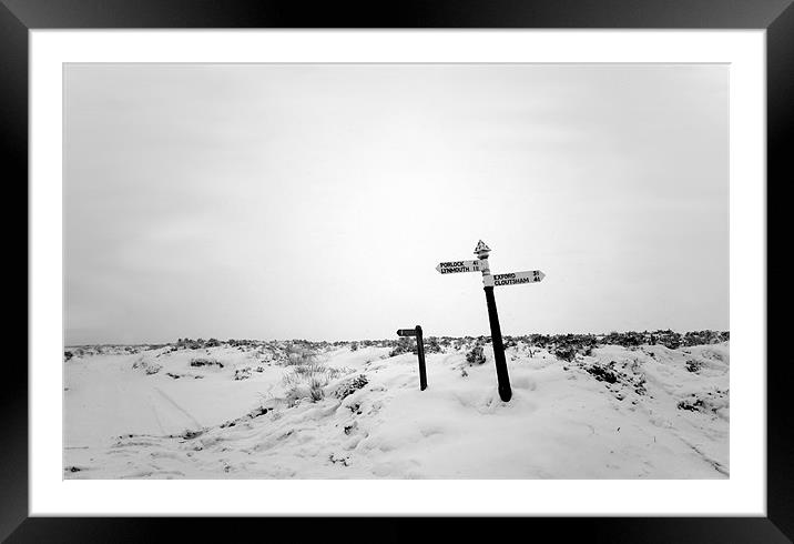 Sign posts in the Snow Framed Mounted Print by Mike Gorton