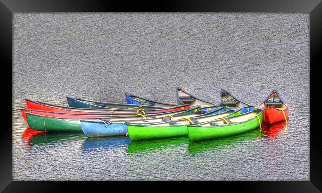 Canoes Canoes and more Canoes Framed Print by Mike Gorton