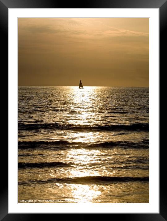 Sailing into a golden sunset Framed Mounted Print by Mike Gorton