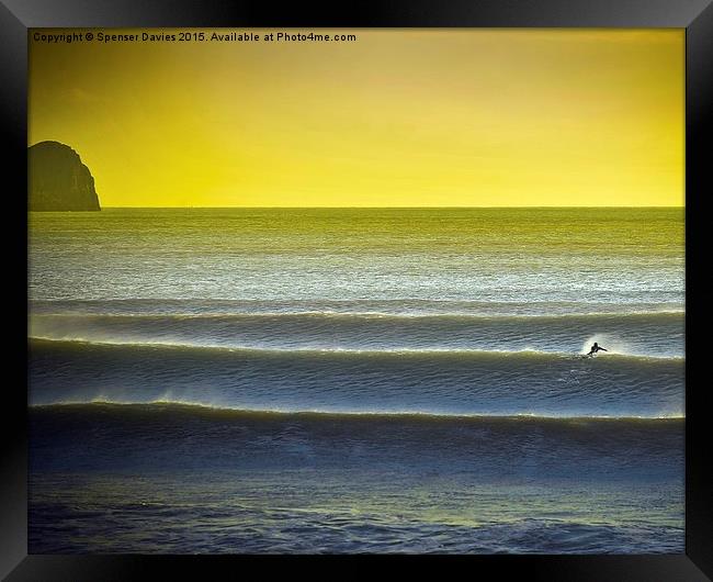  Solo surfing at a Gower beach Framed Print by Spenser Davies