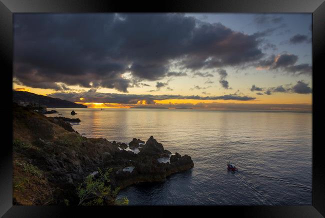Sunrise over Funchal Framed Print by Ceri Jones